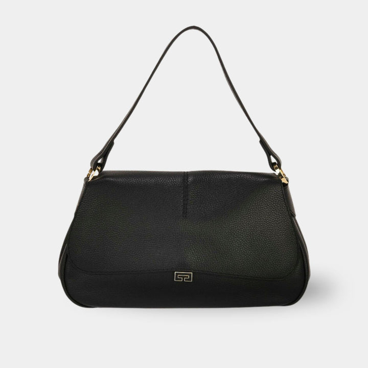 Black pebbled leather shoulder bag with a flap closure. Front view.