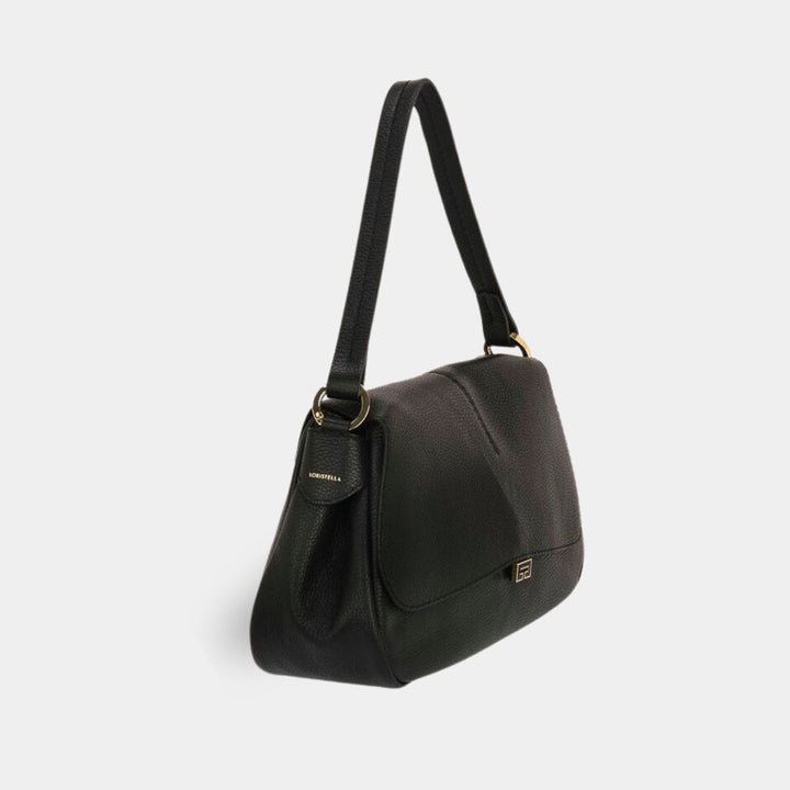 Black pebbled leather shoulder bag with a flap closure. Side view.