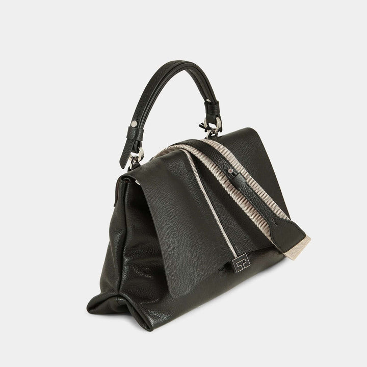 Black pebbled leather top handle bag with a beige stripe in the middle and a matching detachable shoulder strap. Side view.