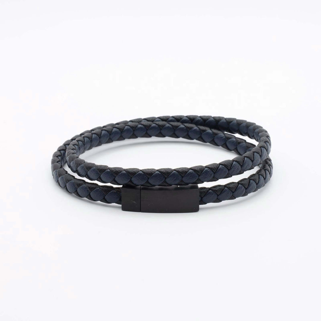 Men's bracelet featuring a double-wrap design crafted from black and blue braided leather. It has a sleek black metal clasp.