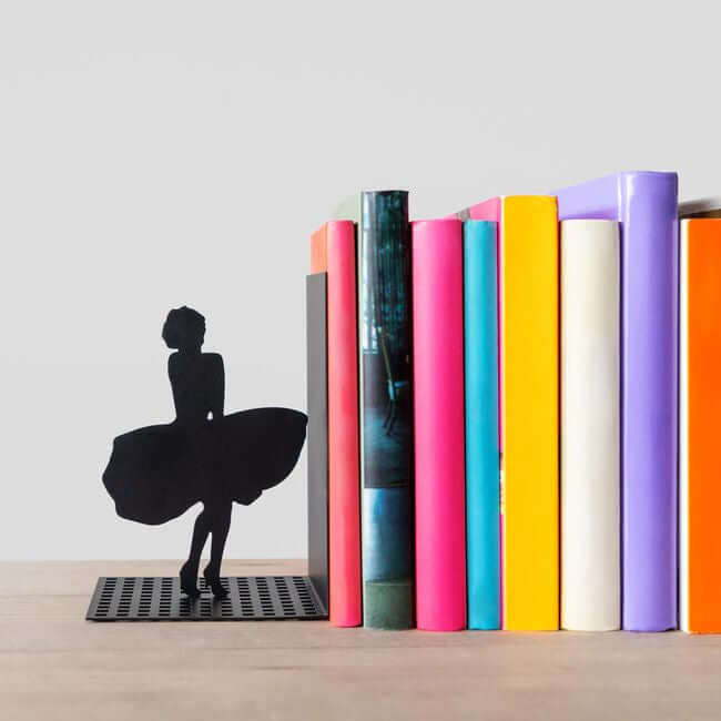 Black metal bookend with a cutout of Marilyn