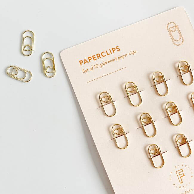 Set of paper clips with a small heart pattern: close-up view.
