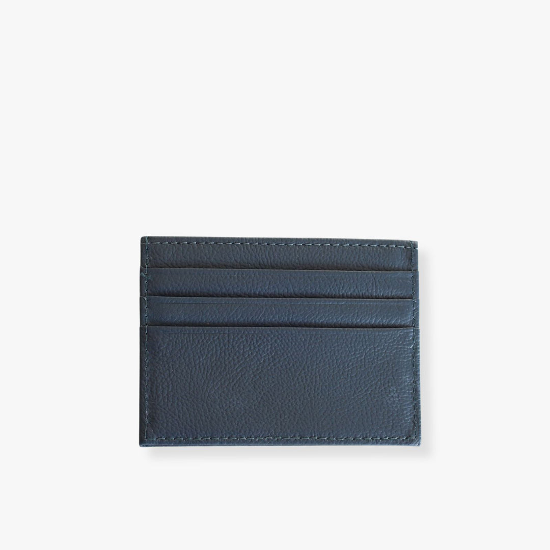 Blue leather card holder with 3 slots on each side.