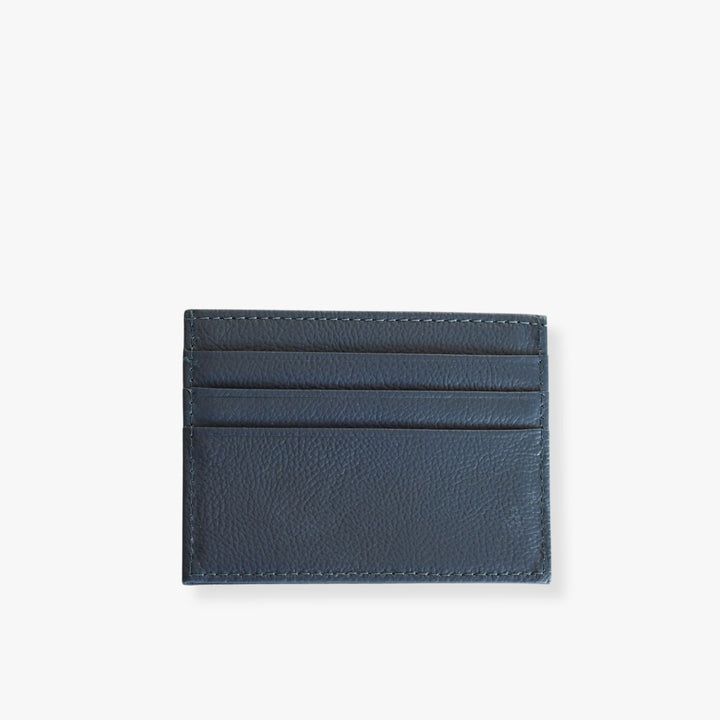 Blue leather card holder with 3 slots on each side.