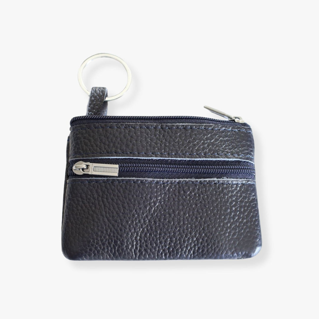 Small blue leather double zipper wallet with an embedded gray metal keychain