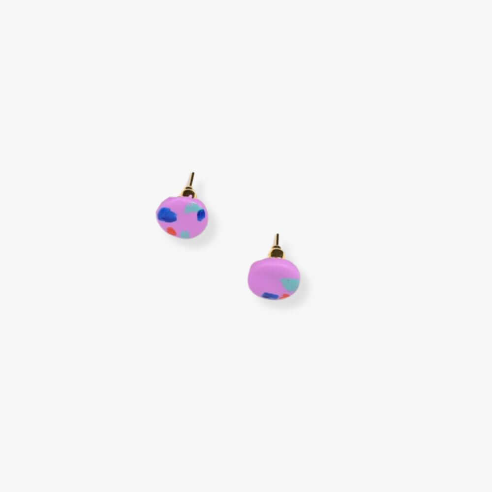 Pink stud earrings with colorful blue, green and red dots