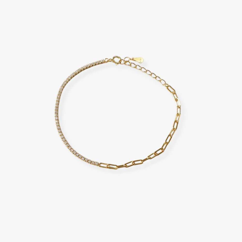 Half tennis bracelet with zirconia and gold plated chain.