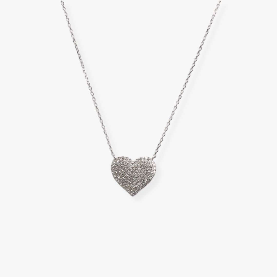Silver necklace with a heart-shaped pendant set with cubic zirconia.
