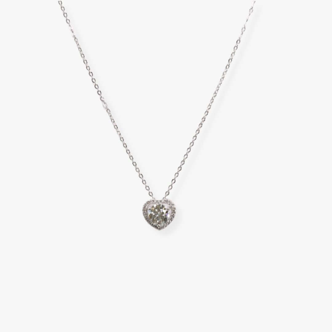 Silver necklace with  heart shaped pendant set with a synthetic diamond.