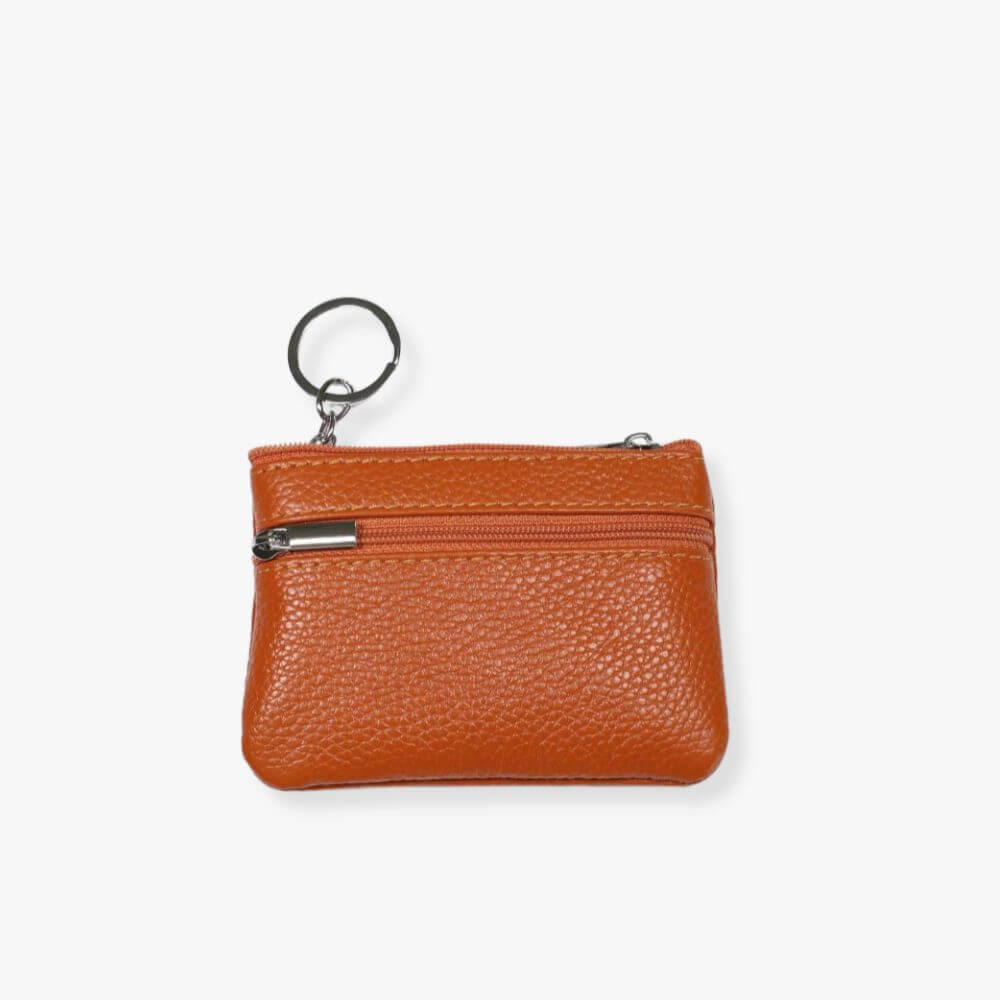 Small orange leather double zipper wallet with an embedded gray metal keychain