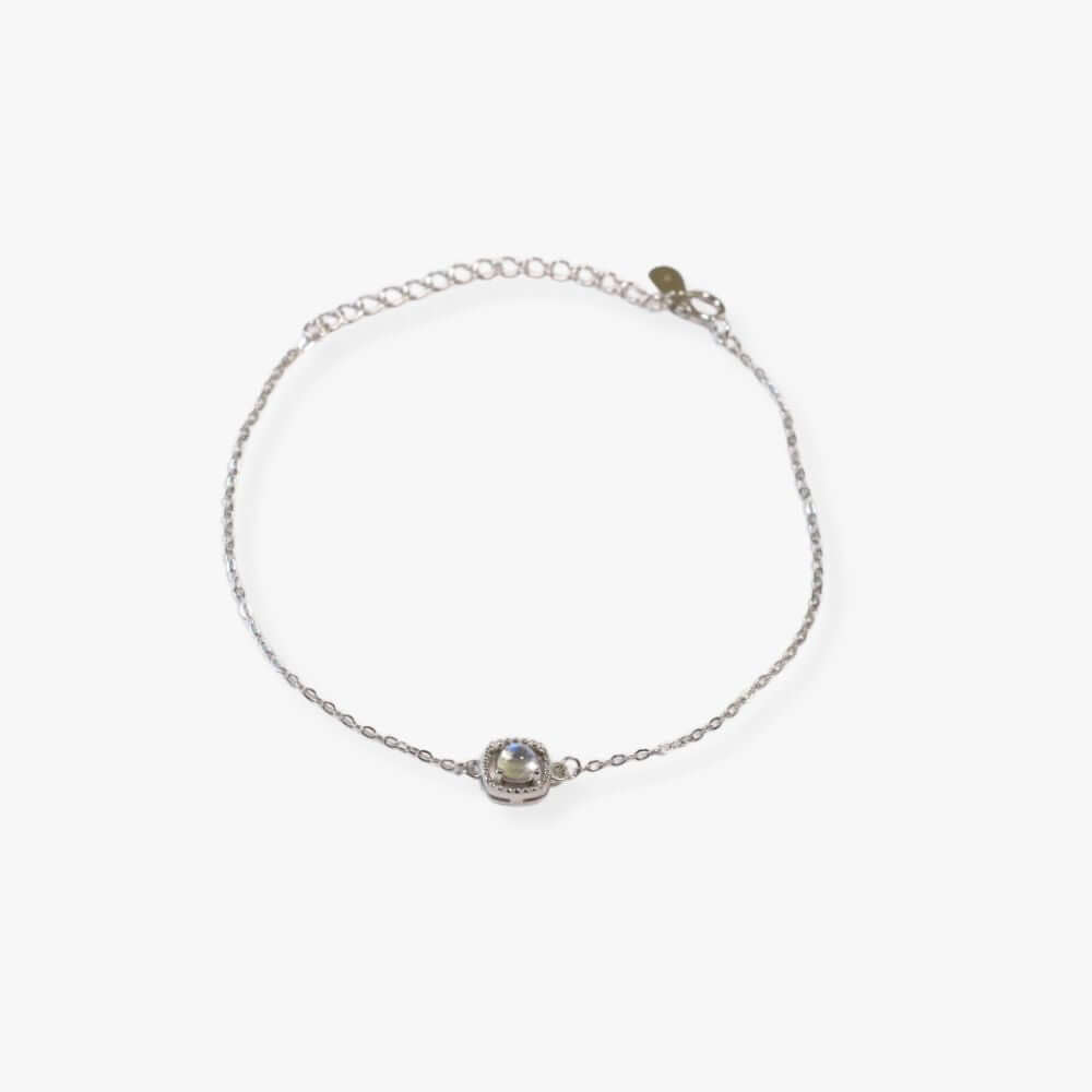 Silver chain bracelet featuring a white moonstone.