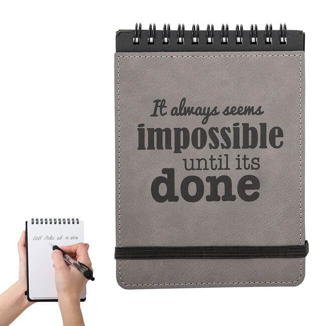 Inspirational notepad with a thumbnail showing a hand writing on it.