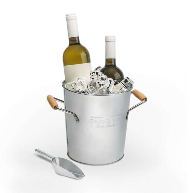 Wine chiller and ice bucket filled with ice and two bottles.
