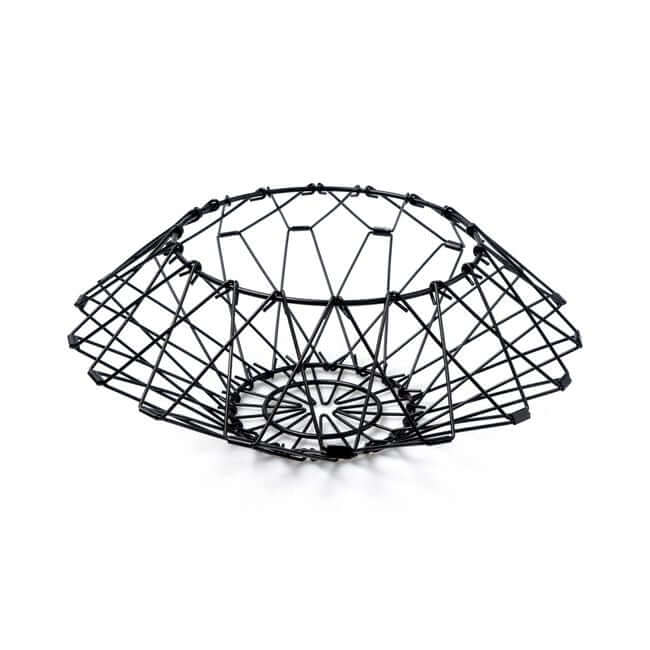 Flexible black wire fruit basket shaped like a bread basket.