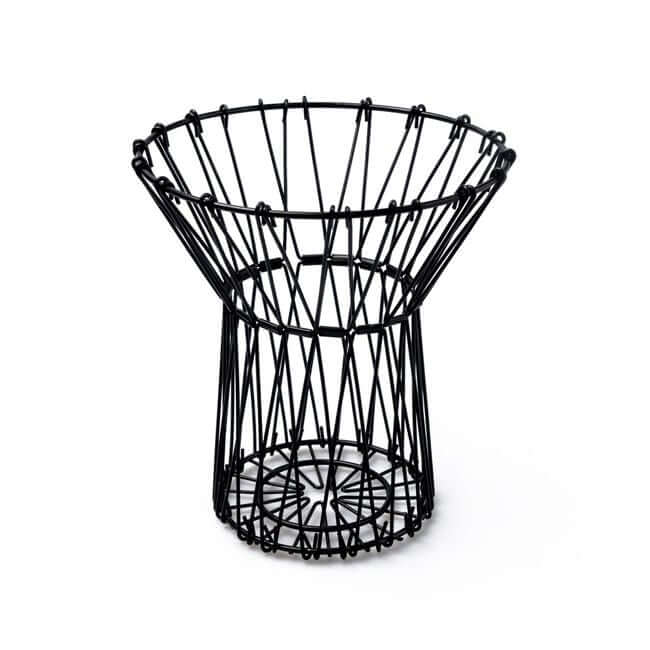 Flexible black wire fruit basket shaped like a vase.