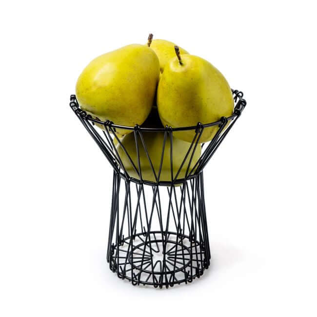 Flexible black wire fruit basket shaped like a vase: view with fruits.