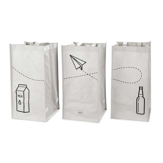 Set of three light gray recycling waste bin bags, shown when not connected with velcro.