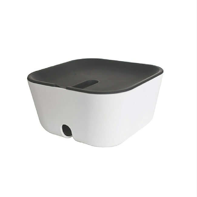 Small white cable organizer box with a black lid.