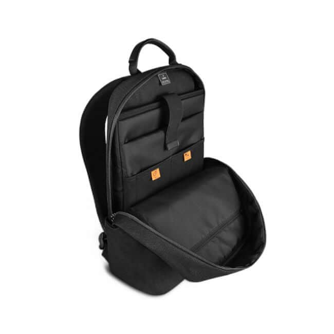 A black laptop backpack with several inner compartments.
