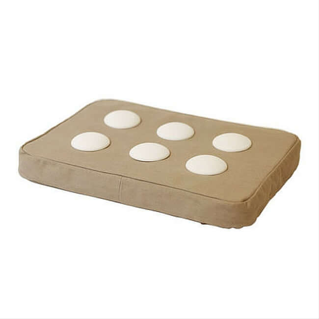 Beige laptop cushion with 6 silicone pads that prevent the laptop from overheating.