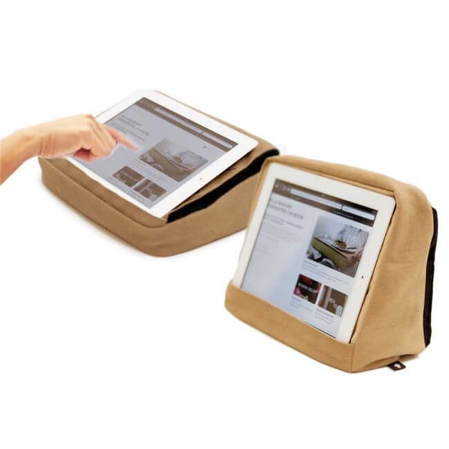 Beige tablet cushion with pockets for holding and storing the tablet, shown in two positions: horizontal and vertical.